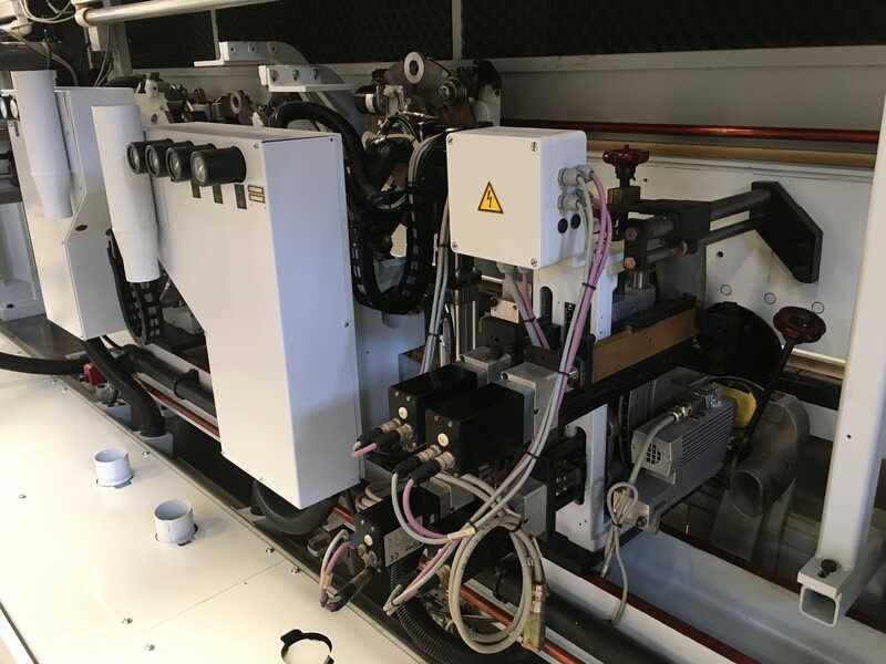 Homag Двухсторонний кромкооблицовочный автомат - бывший в употреблении KF 20 (15)